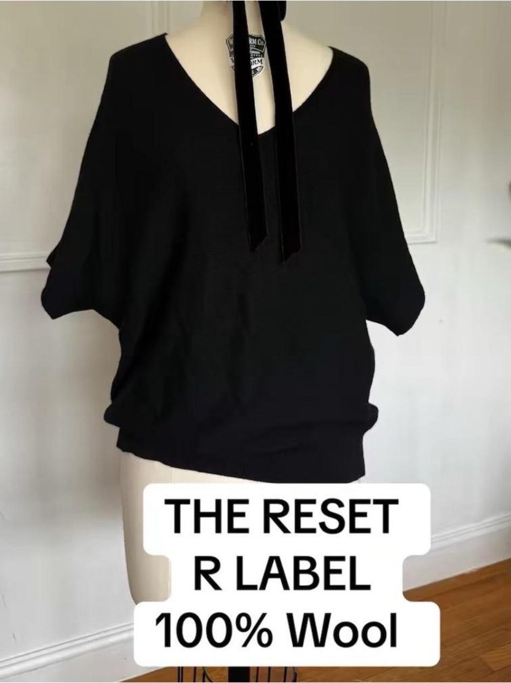 The Reset Black V-Neck Wool Sweater. Small medium